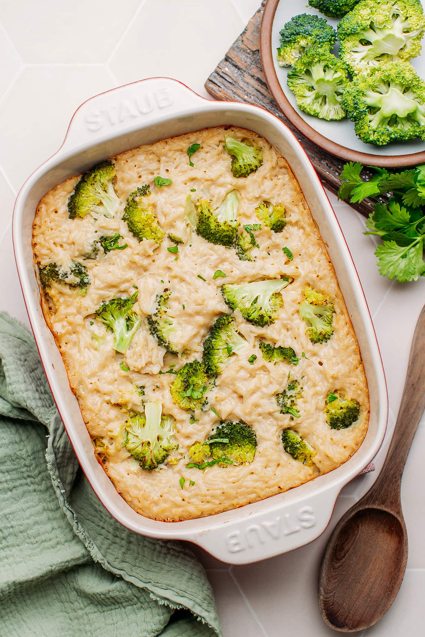 Broccoli and rice casserole topped with chopped cilantro.