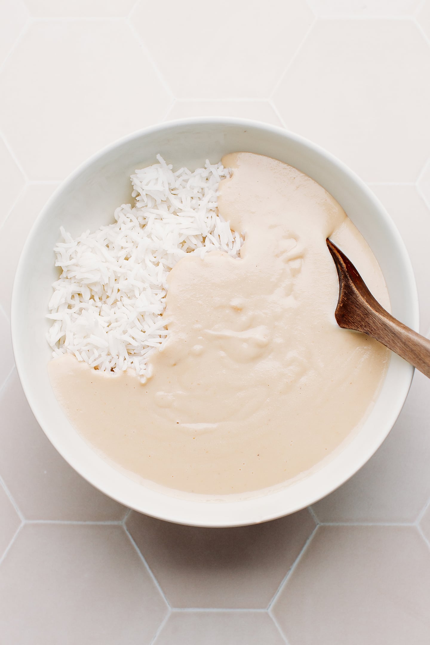Rice and cheese sauce in a bowl.