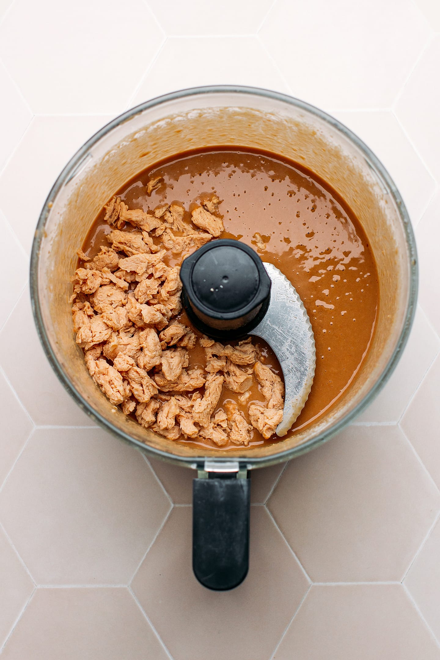 Bean paste and soy curls in a food processor.