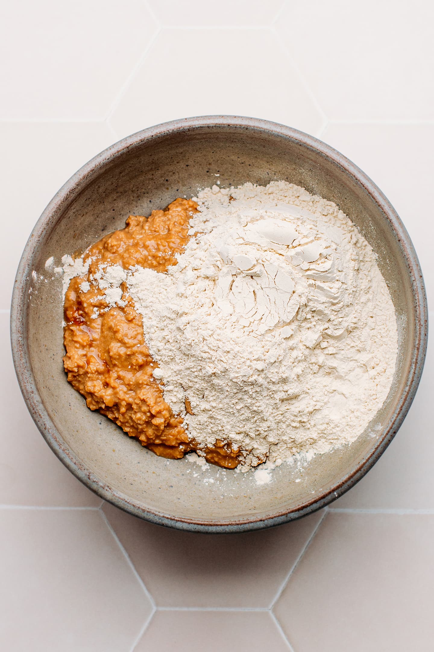 TVP mixture and vital wheat gluten in a mixing bowl.