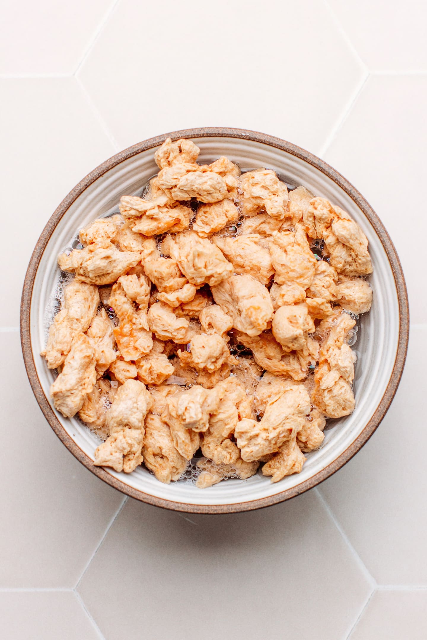 Rehydrated soy curls in a small bowl.