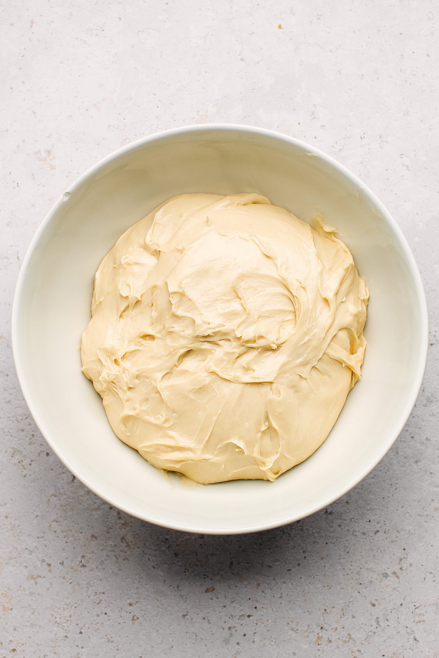Dough in a mixing bowl.