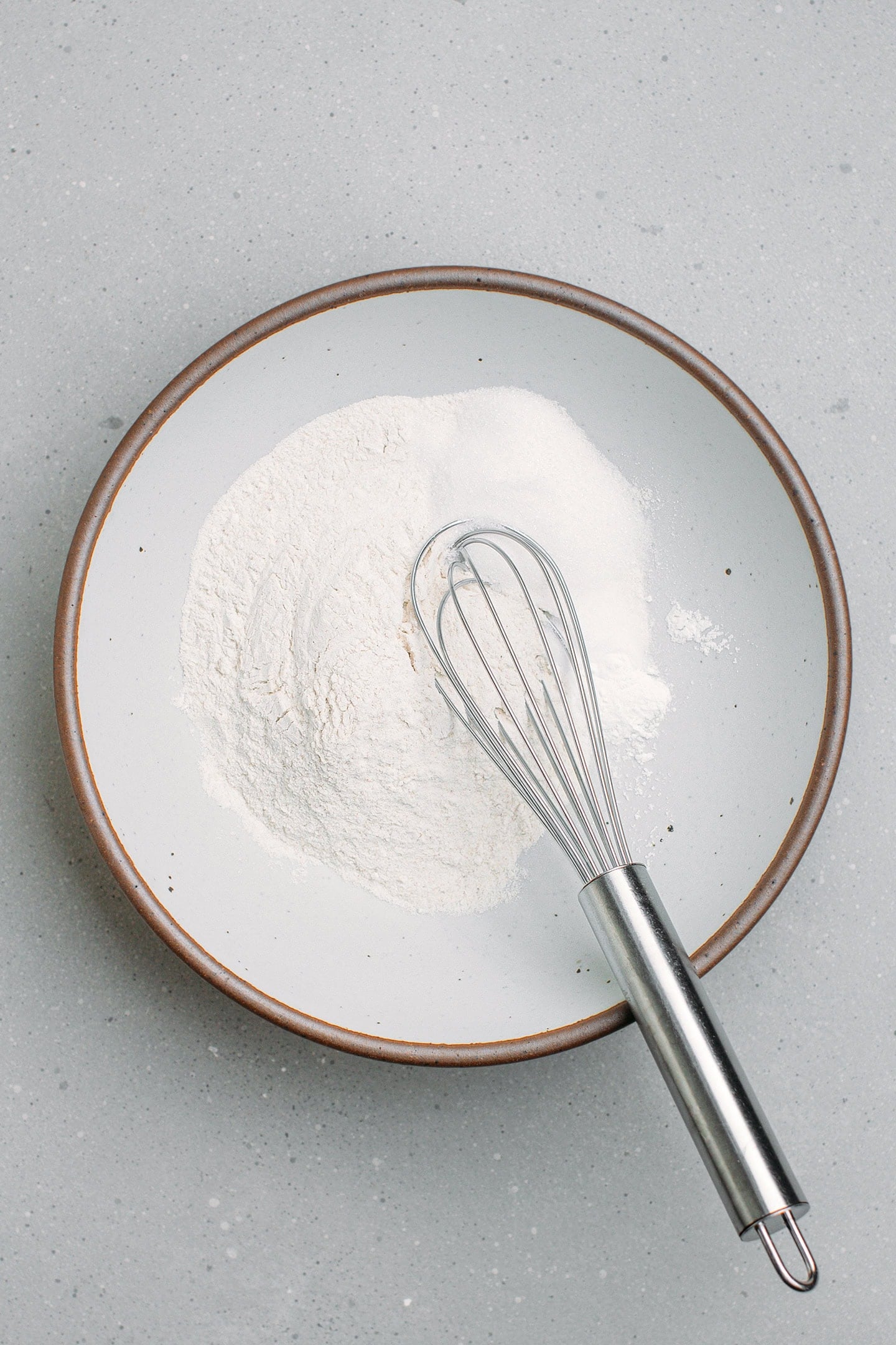 Buckwheat flour, sugar, salt, and baking powder in a mixing bowl.