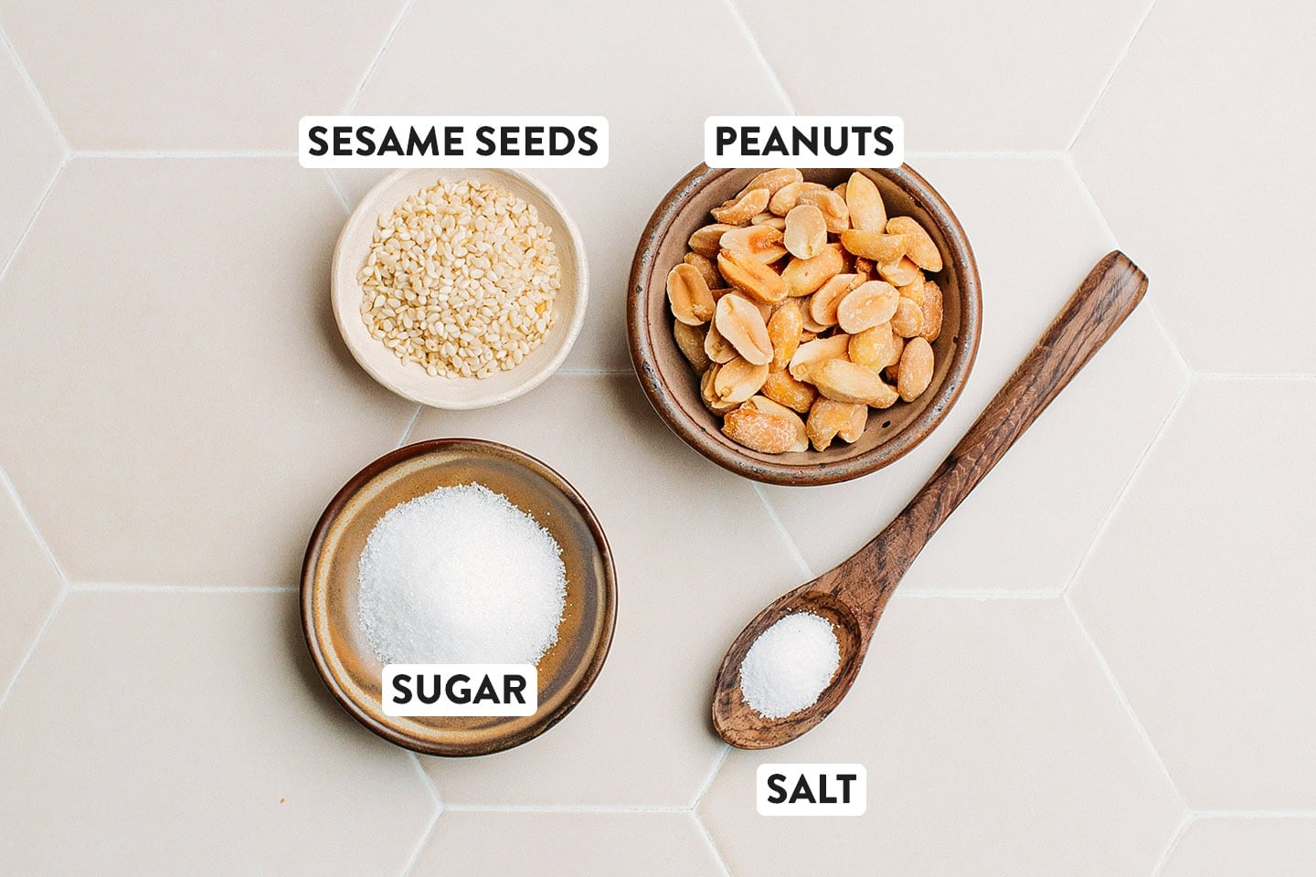 Ingredients like roasted peanuts, sesame seeds, sugar, and salt.