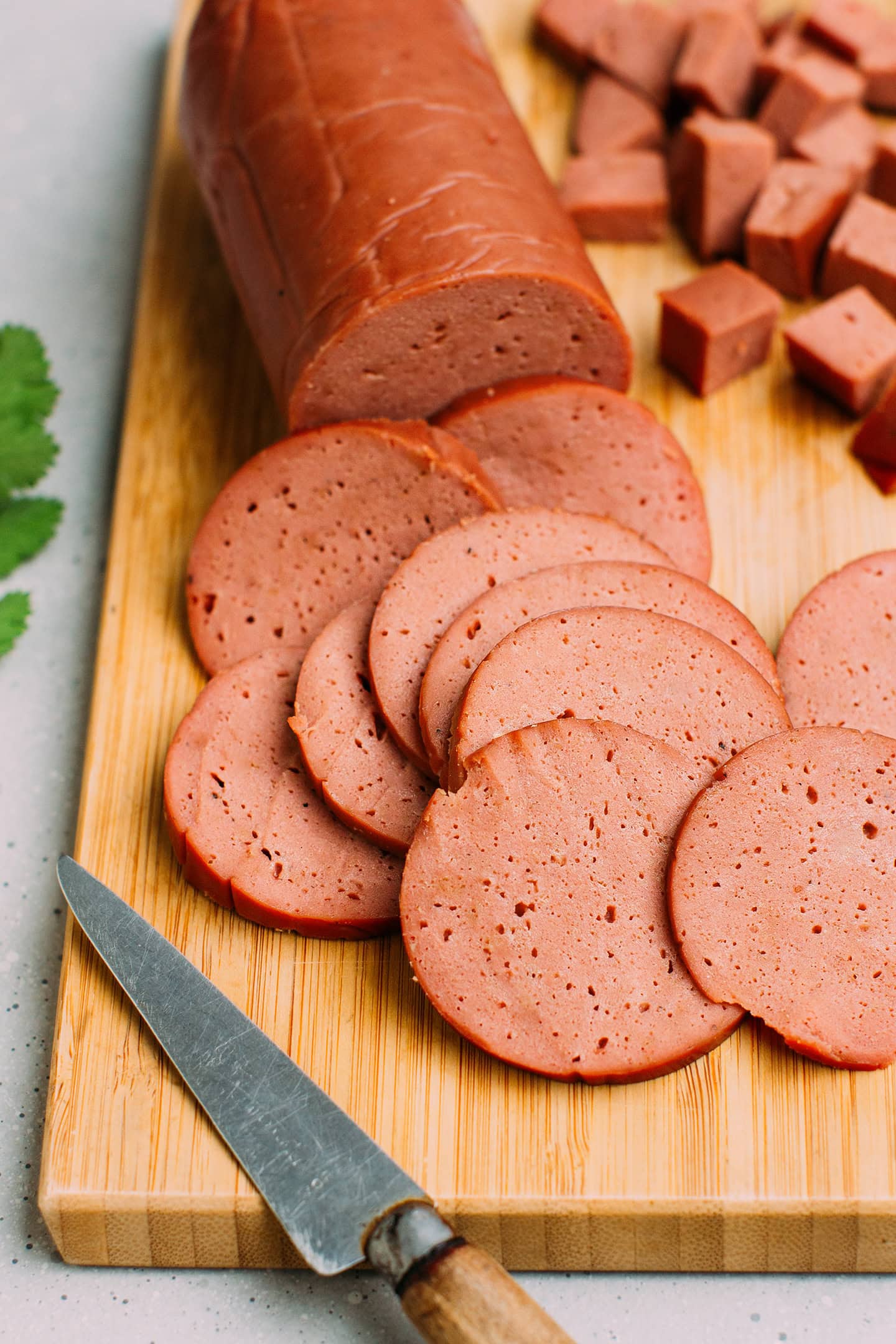 Vegan deli slices on a cutting board.