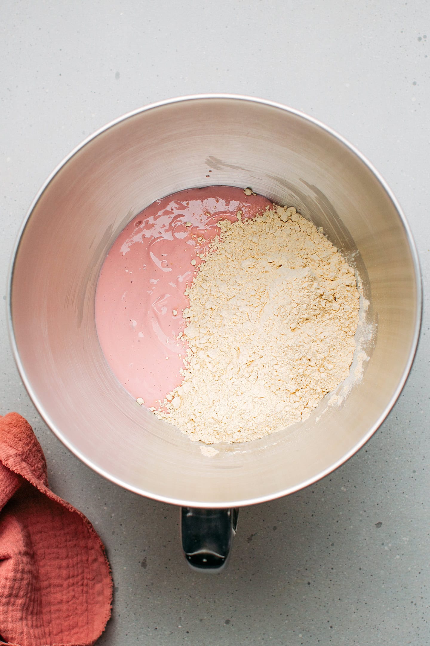 Blended tofu with vital wheat gluten in a stand mixer bowl.