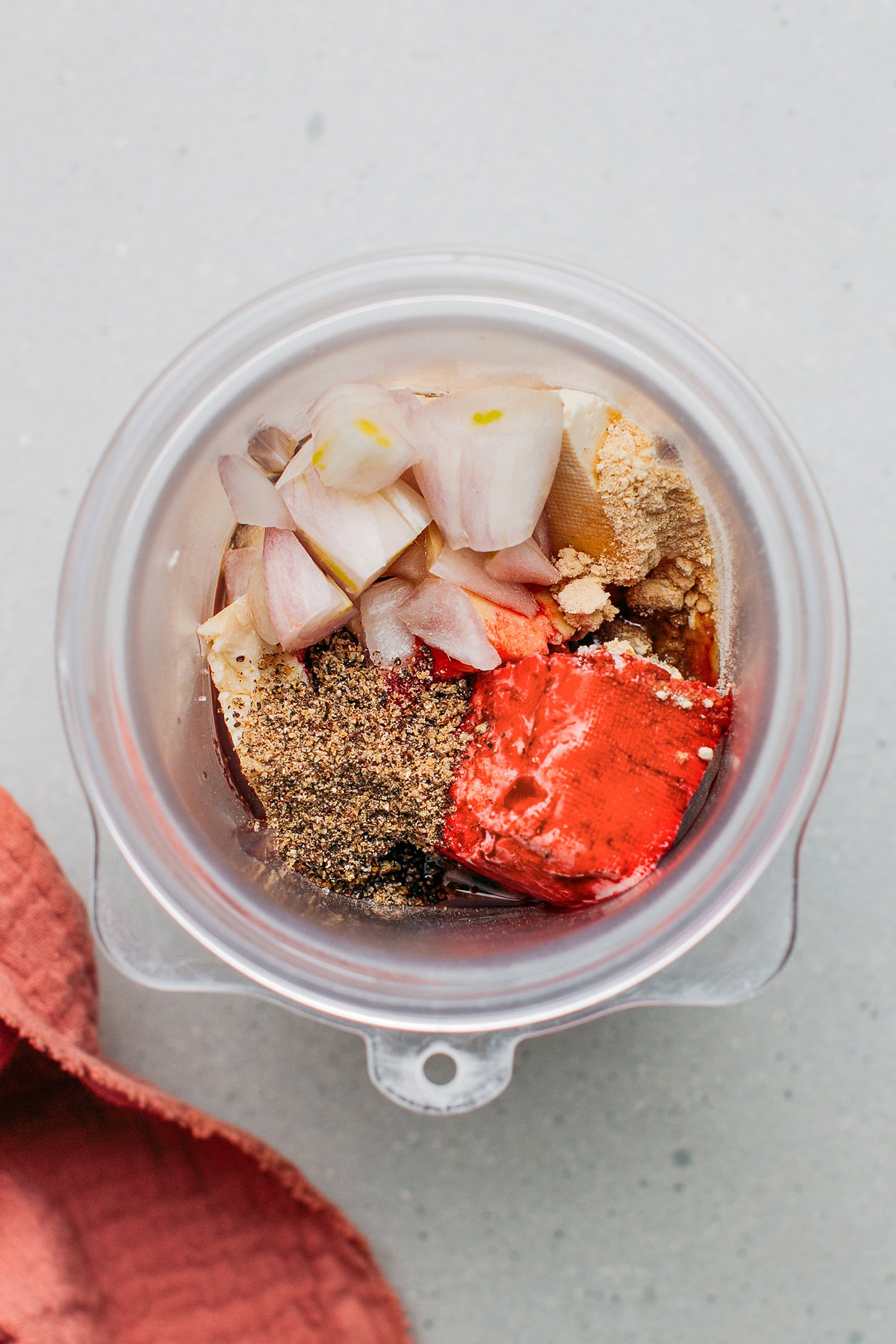 Tofu, shallots, and seasonings in a blender.