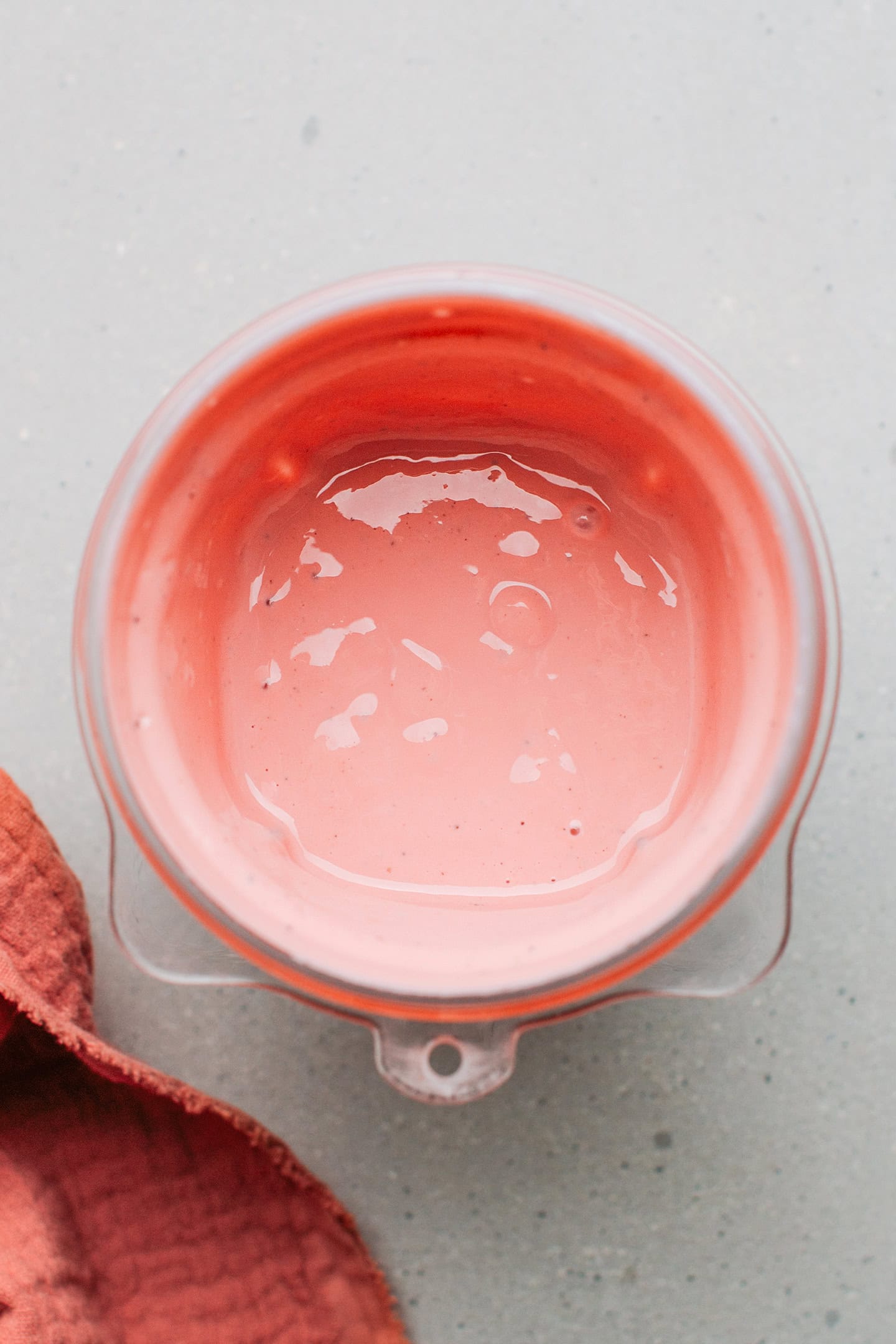 Tofu blended with water and seasonings in a blender.