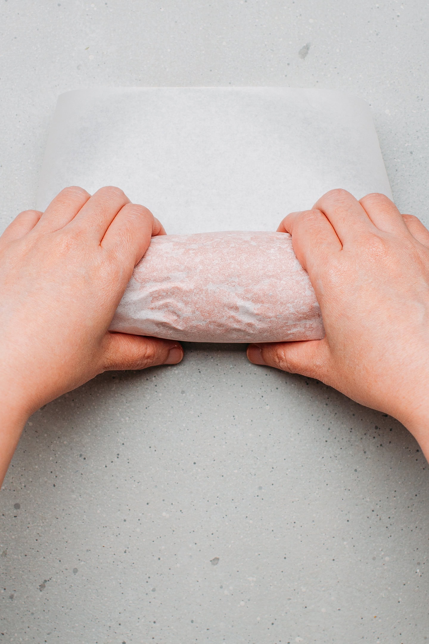 Wrapping seitan loaf with parchment paper.
