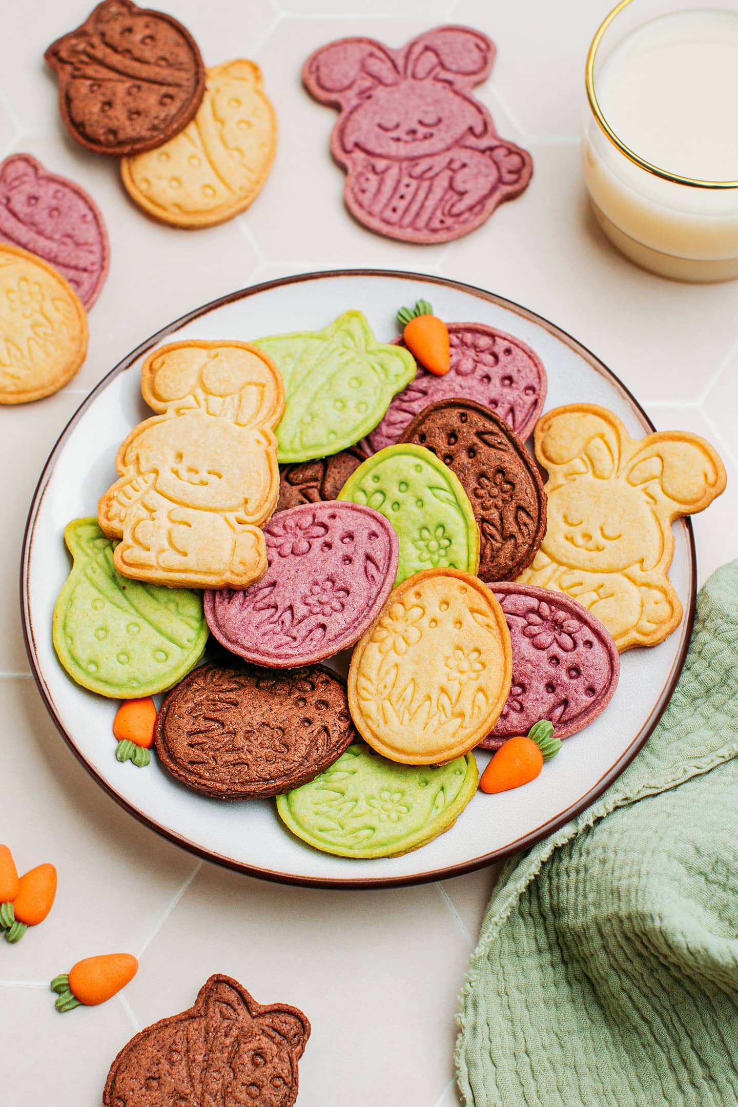 Plate filled with colorful easter sugar cookies.