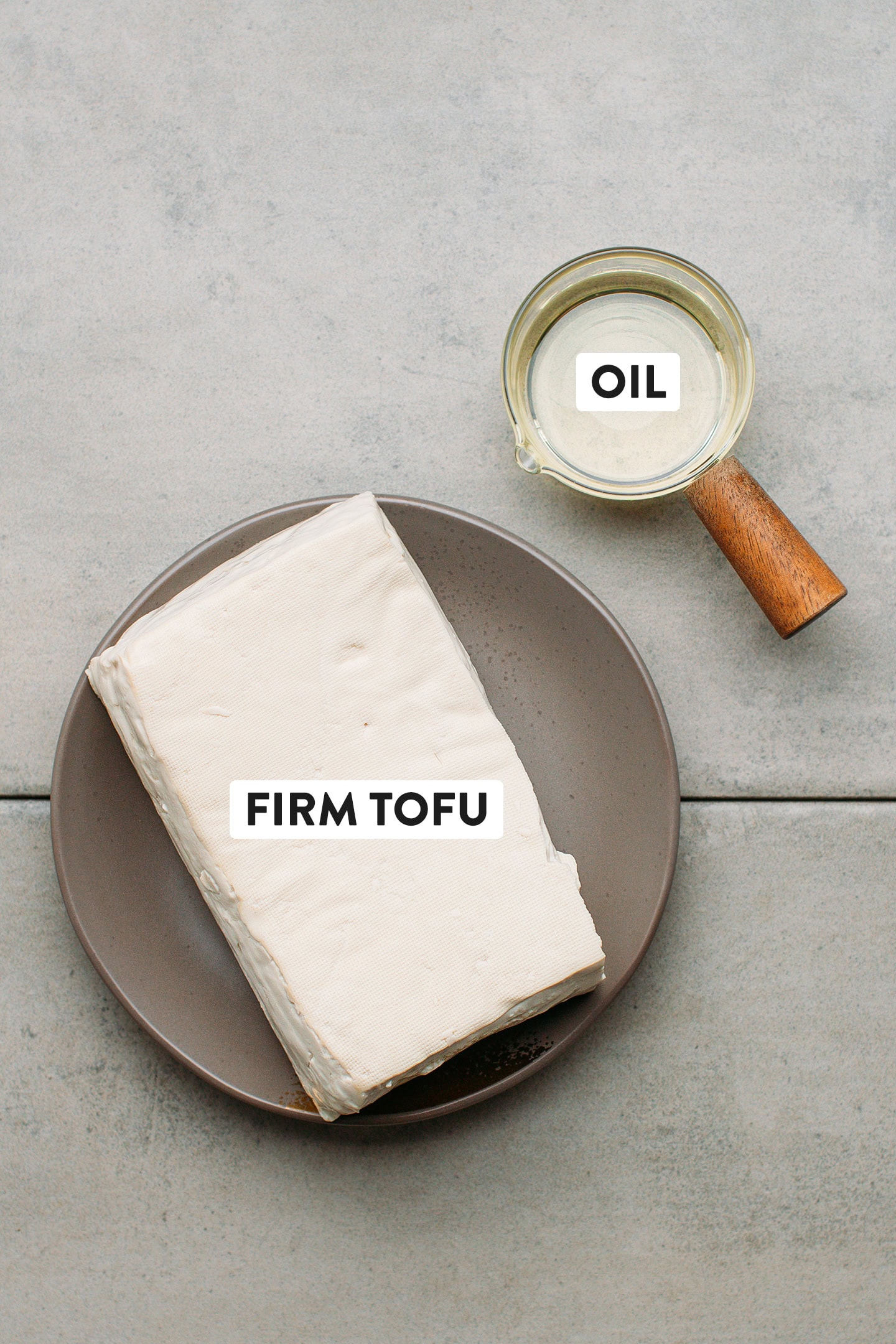Ingredients like firm tofu and oil.