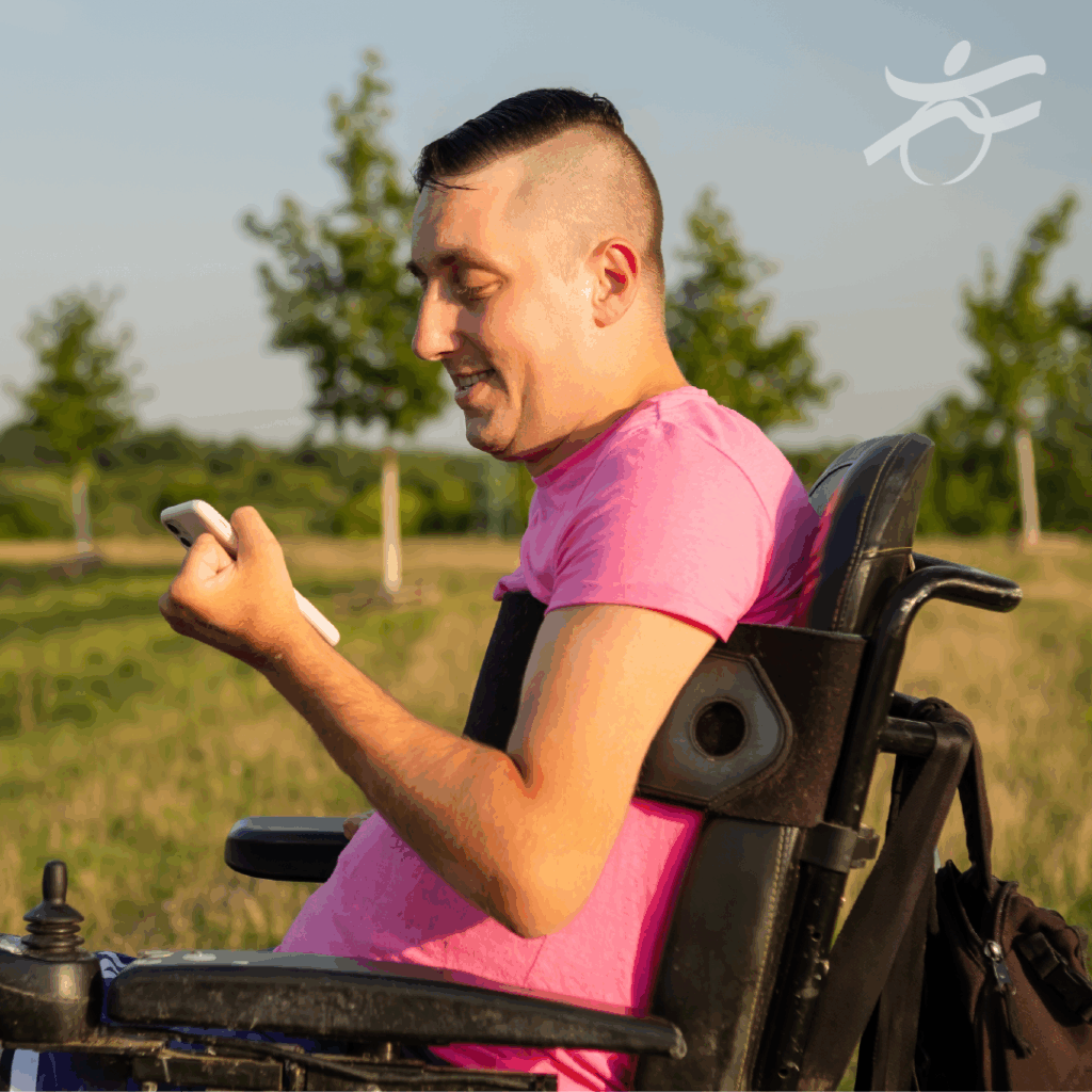 man on phone outside smiling