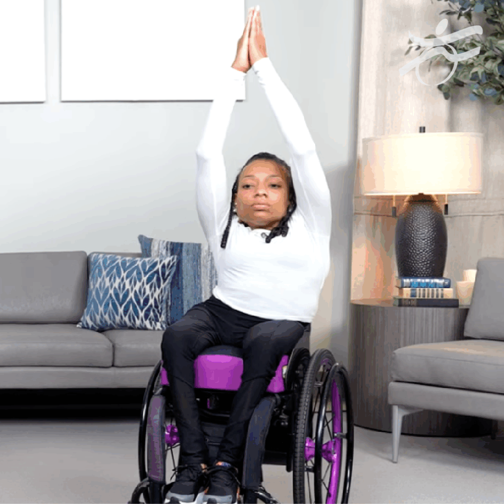 Woman who uses a wheelvhair stretching