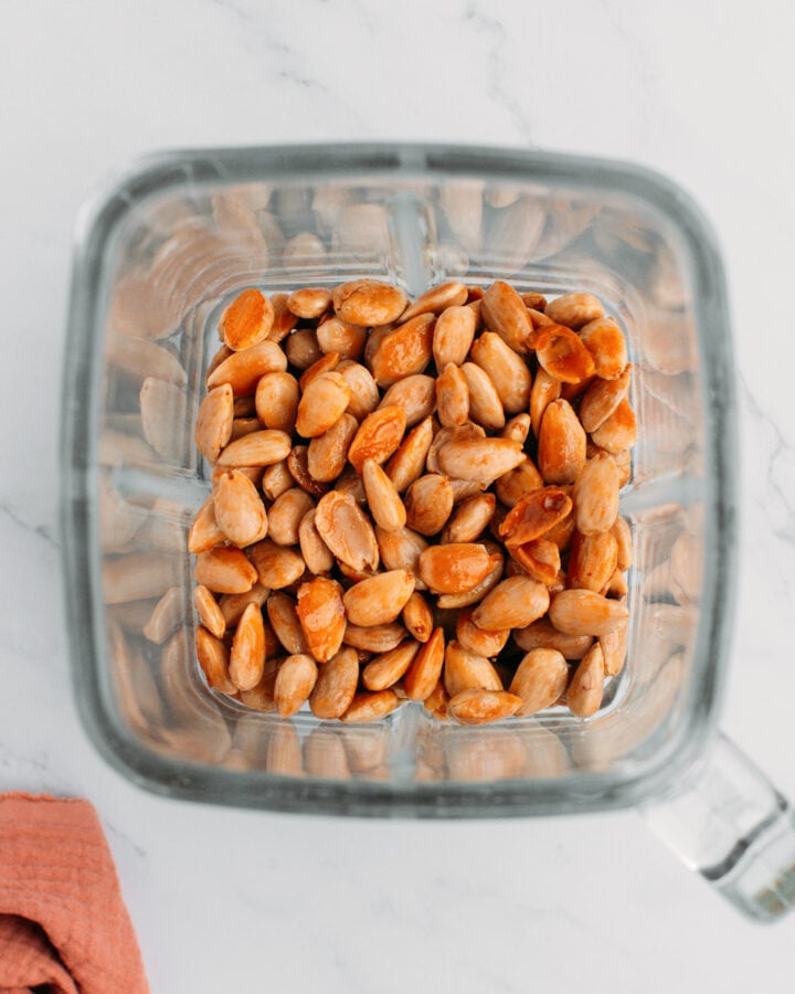 Roasted almonds in a blender.