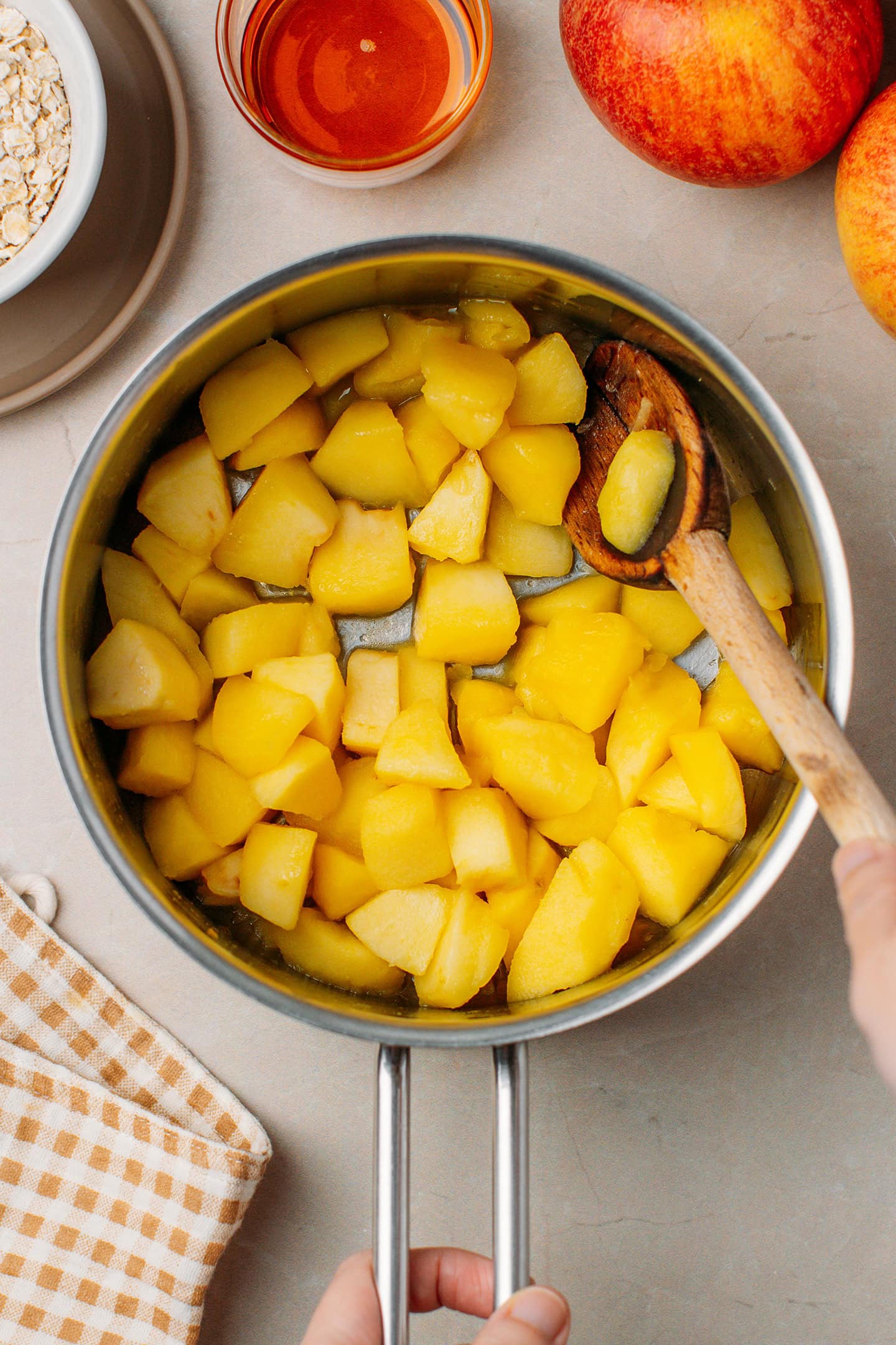 Sautéed apples in a saucepan.