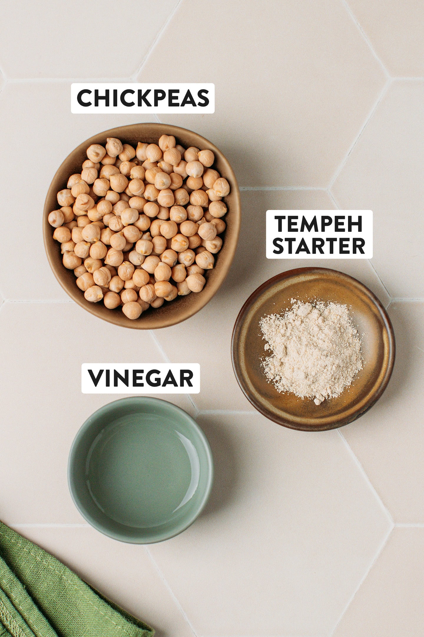Ingredients like chickpeas, tempeh starter, and vinegar.