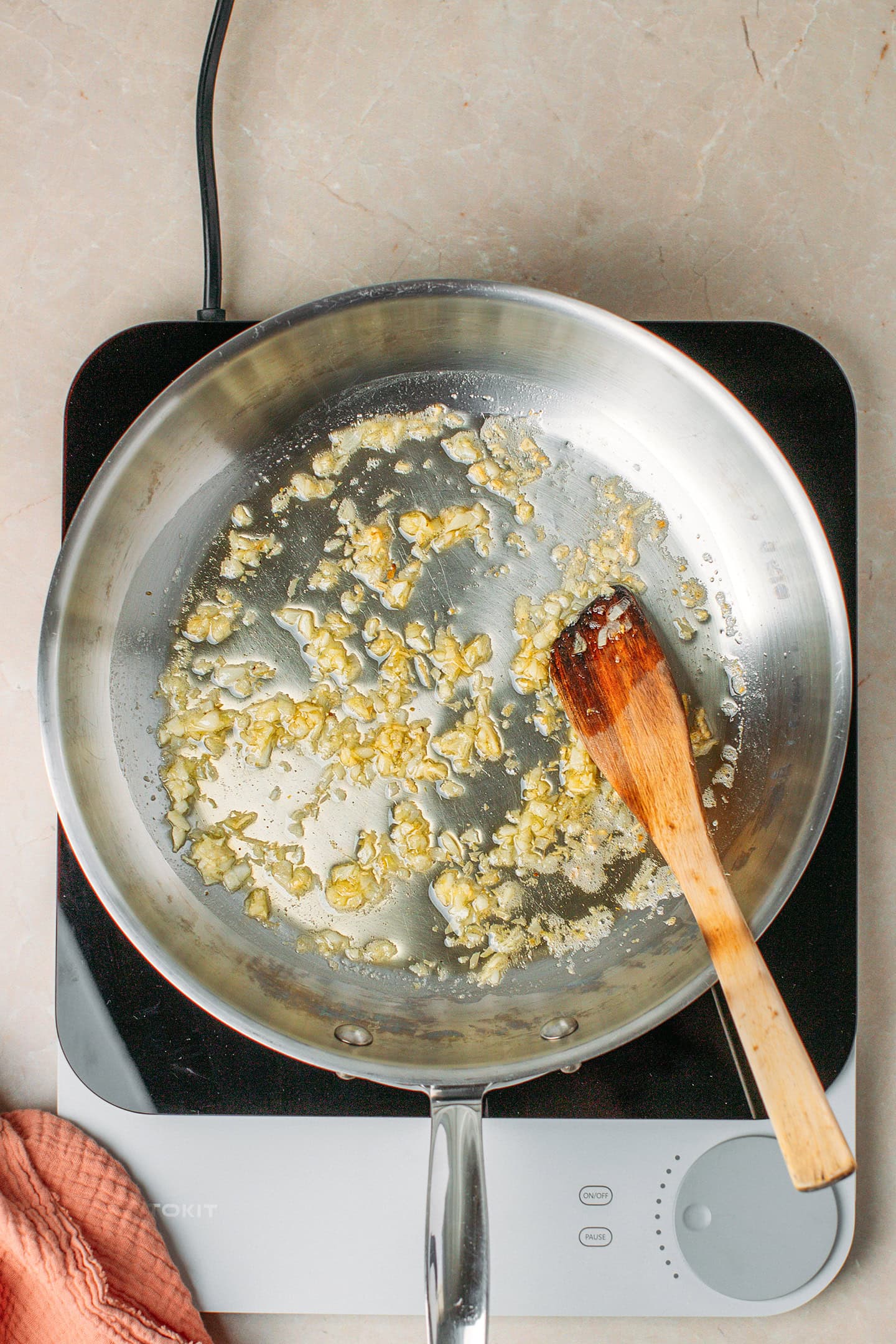 Sautéed garlic in a skillet.