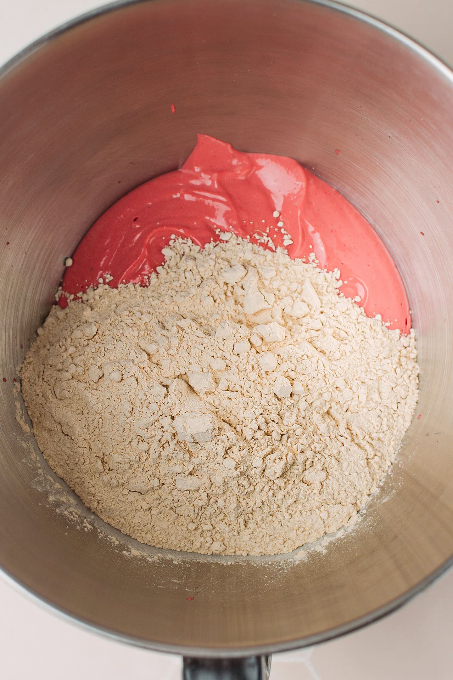 Tofu cream and vital wheat gluten in a stand mixer bowl.