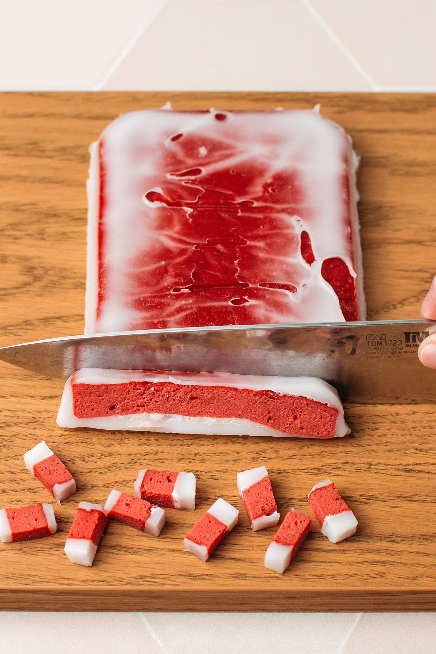 Slicing vegan bacon into lardons.