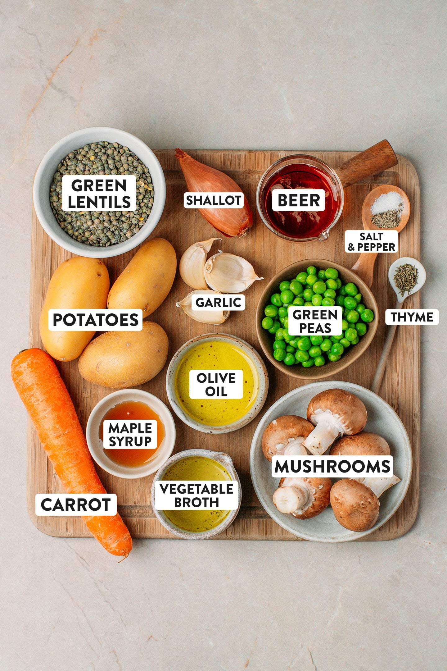 Ingredients like potatoes, carrots, mushrooms, and green lentils.
