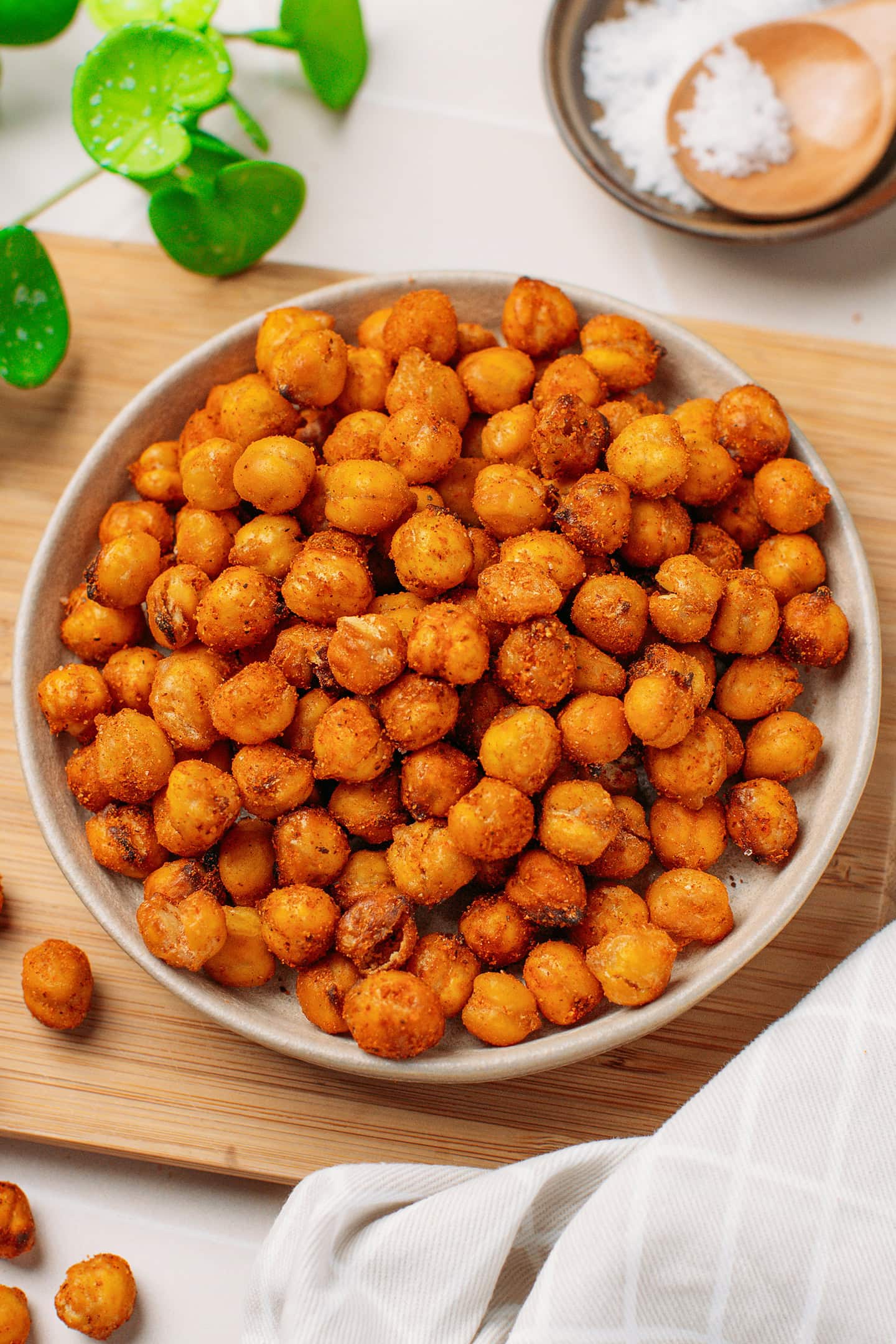 Crispy golden-brown chickpeas inside a small plate.