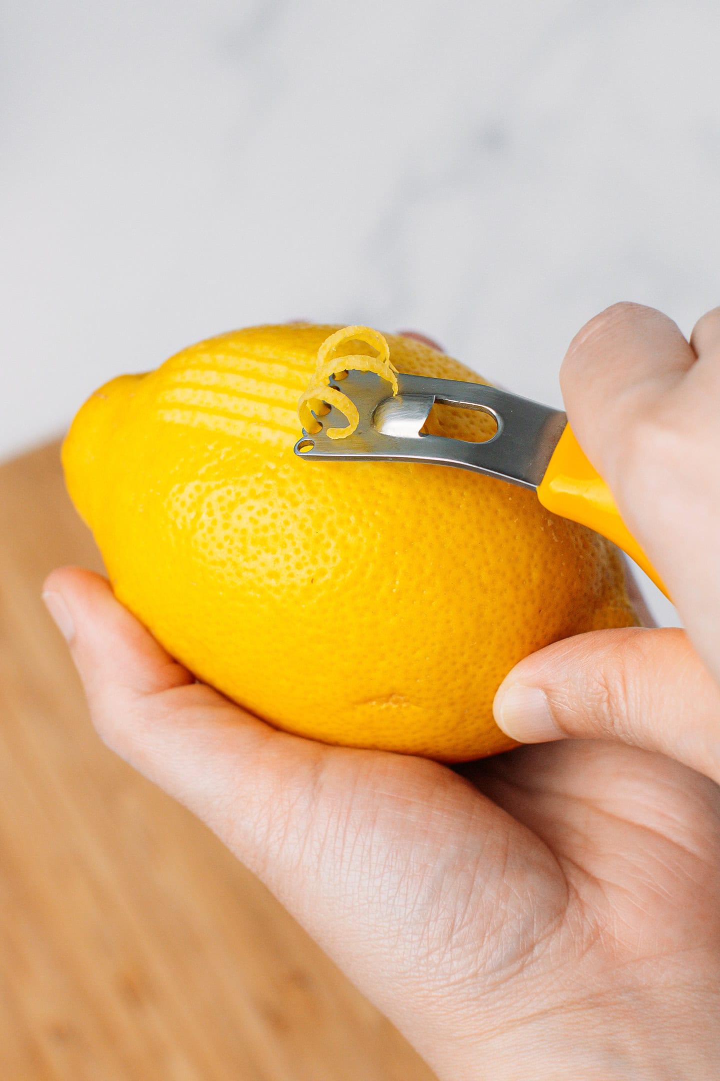 Zesting a lemon.