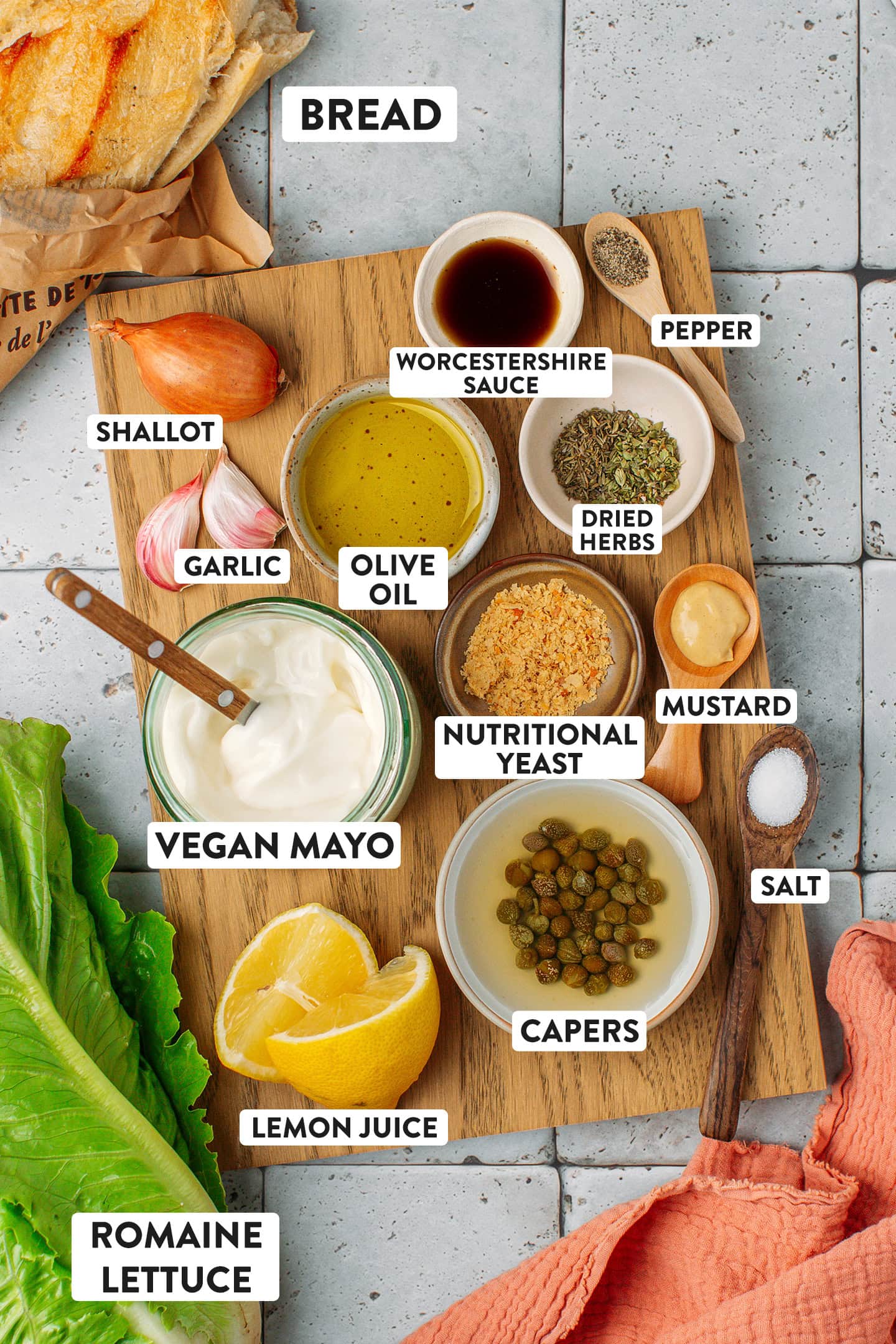 Ingredients like vegan mayo, capers, nutritional yeast, dried herbs, and olive oil.