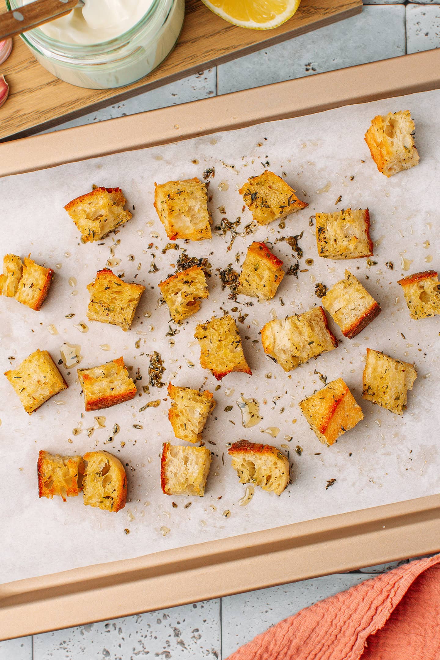 Baked croutons on a baking sheet.