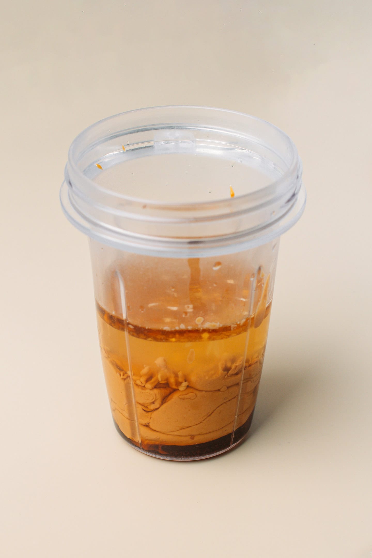 Peanut butter, water, and soy sauce in a blender.