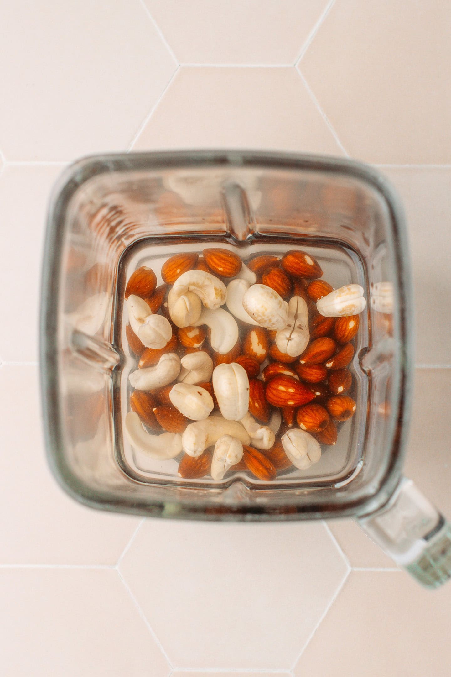 Soaked almonds and cashews and water in a blender.