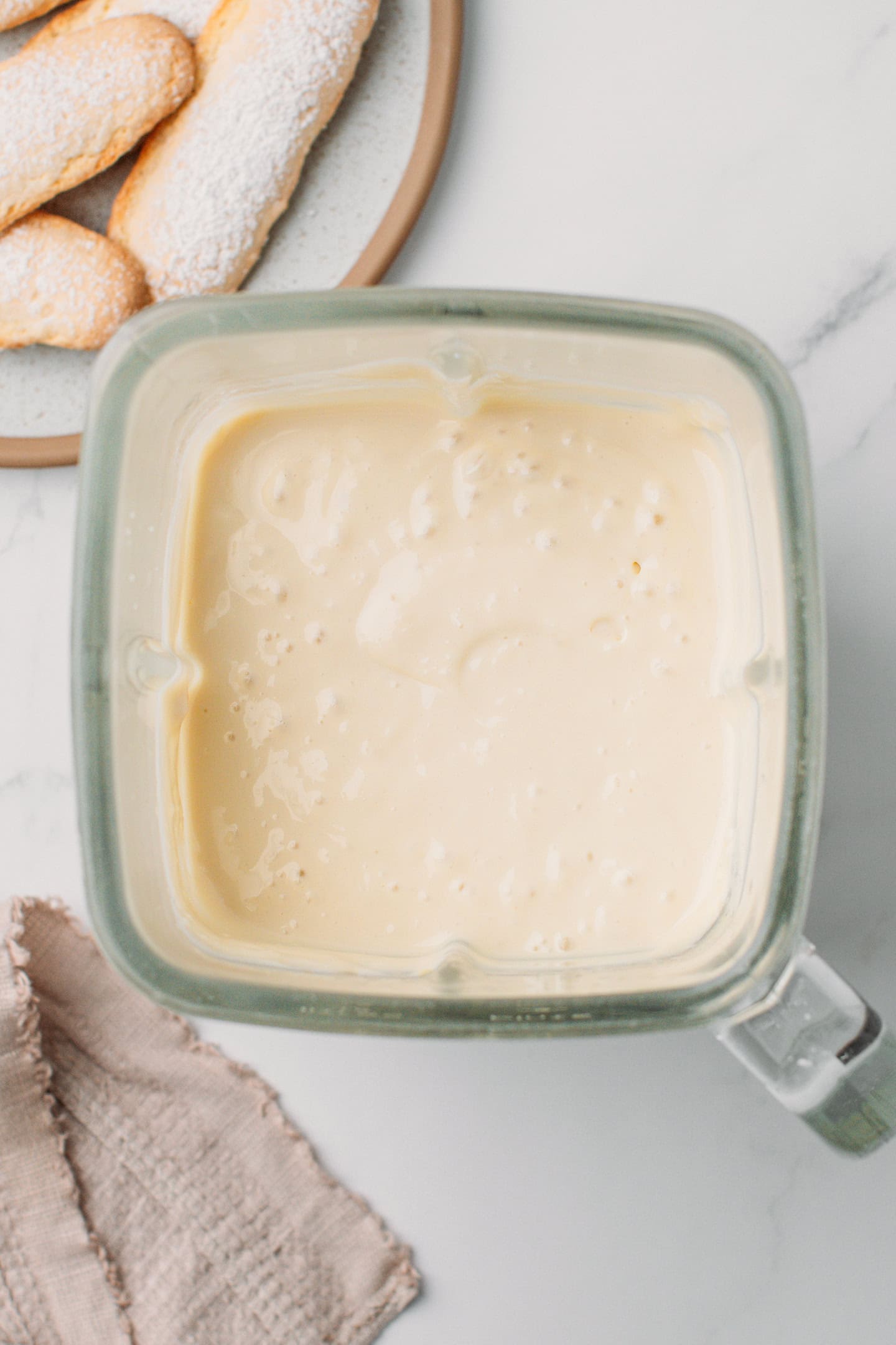 Blended vanilla cream in a blender.