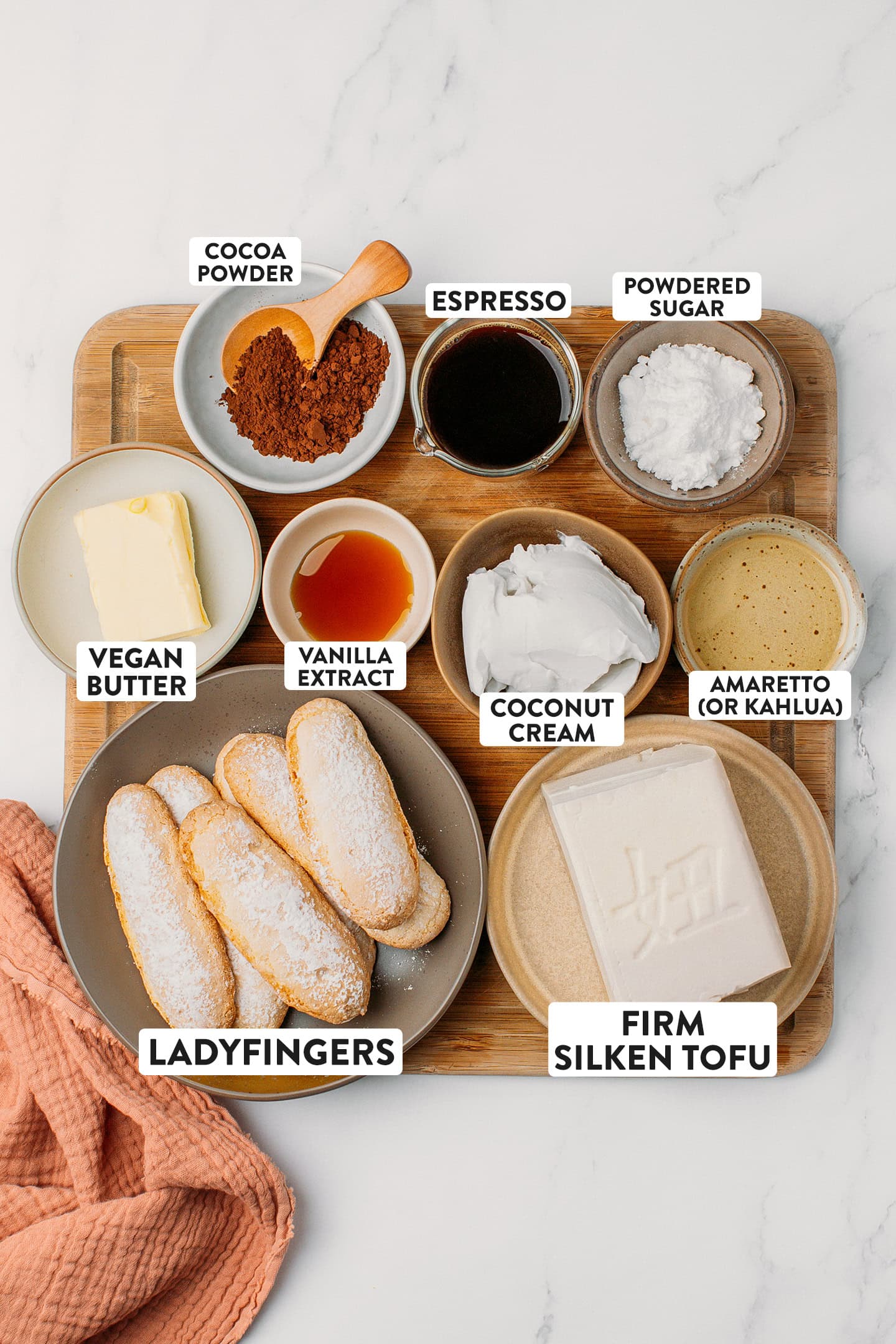 Ingredients like ladyfingers, firm silken tofu, coconut cream, and vegan butter.