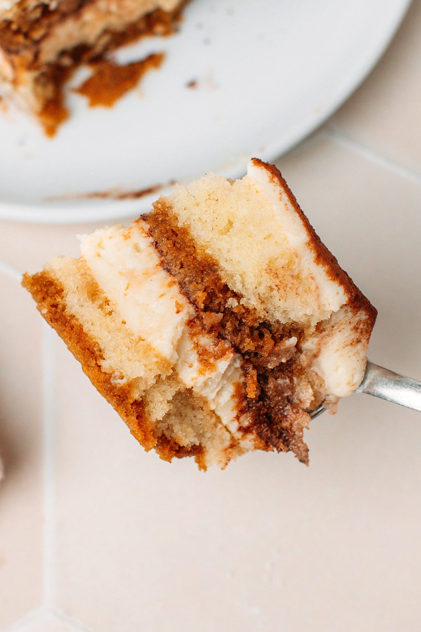 Close-up of a bite of vegan tiramisu.