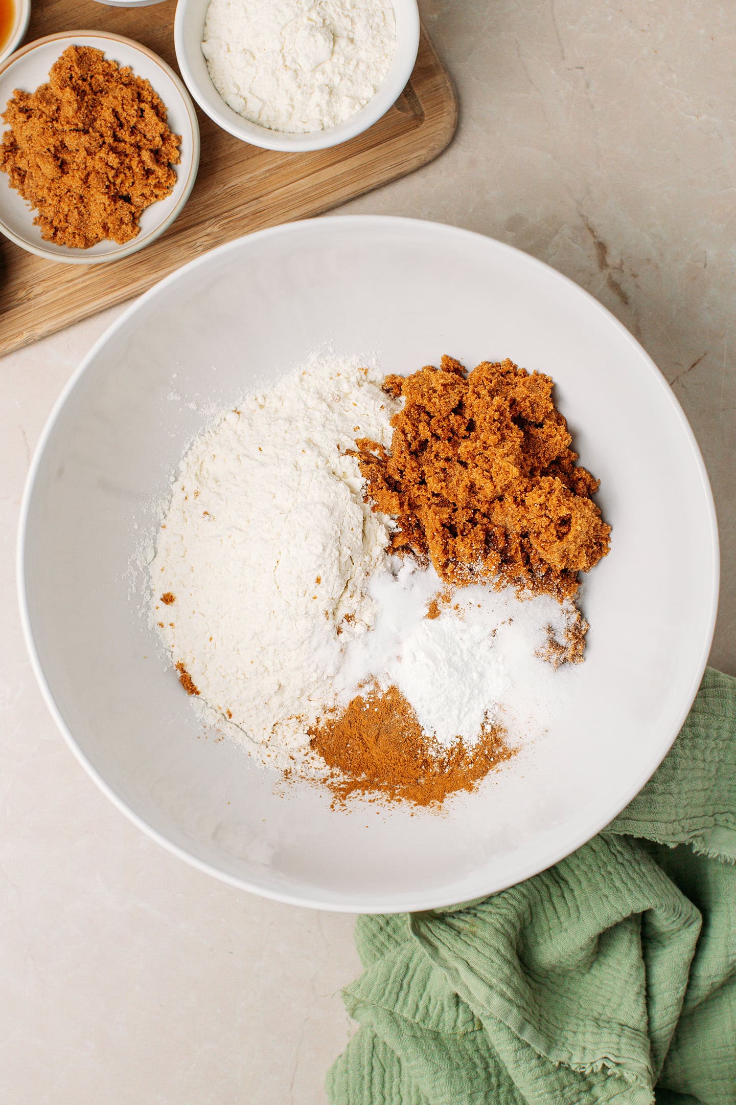 Light brown sugar, flour, and ground cinnamon in a mixing bowl.